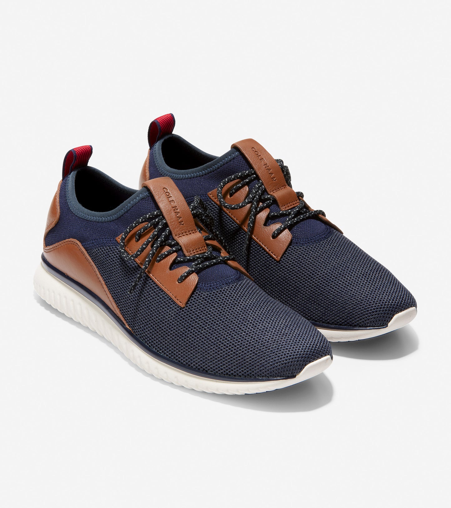 ColeHaan-GrandMøtion Stretch Sneaker-c30653-Marine Blue Knit