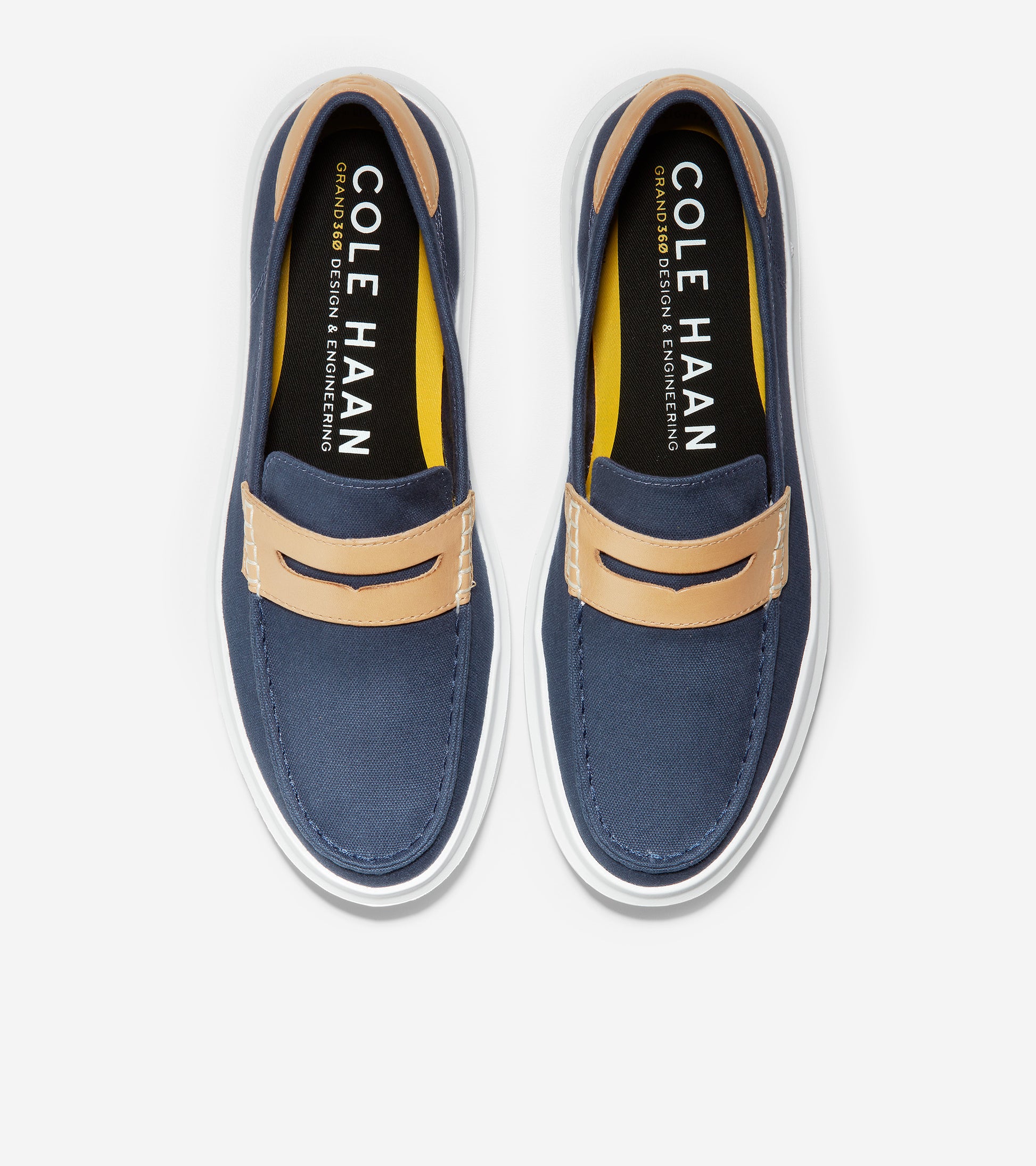 ColeHaan-GrandPrø Rally Canvas Penny Loafer-c34727-Vintage Indigo-Natural
